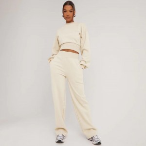 LANGE MOUW ELASTICATE WAIST DETAIL CROPPED SWEATER IN CREAM