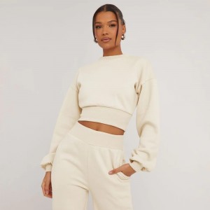 LANGE MOUW ELASTICATE WAIST DETAIL CROPPED SWEATER IN CREAM