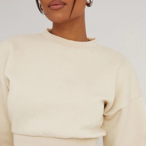 LANGE MOUW ELASTICATE WAIST DETAIL CROPPED SWEATER IN CREAM